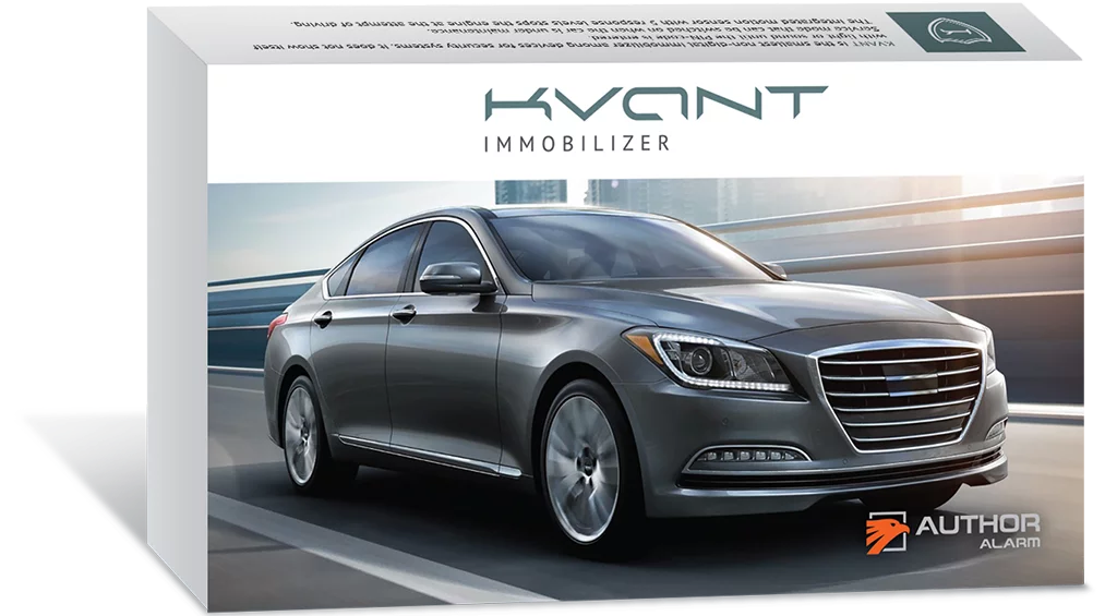 Package with a silver sedan and Kevant Immoblizer branding. The car is driving on a city street.