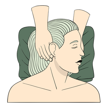 A woman with long hair receiving a head massage from another person's hands.