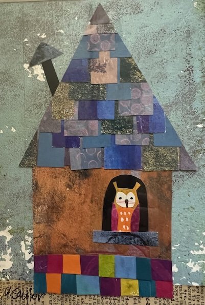 A collage artwork of a house with a tree, made from colored paper and magazine cutouts, featuring an owl inside the house.