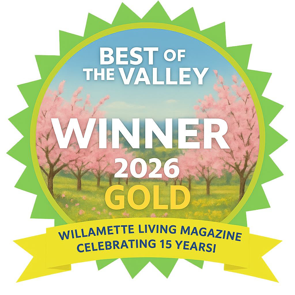 Award badge with a scenic background of pink cherry blossom trees and a green field, indicating the Willamette Living Magazine Best of the Valley 2026 Gold Winner, celebrating 15 years.