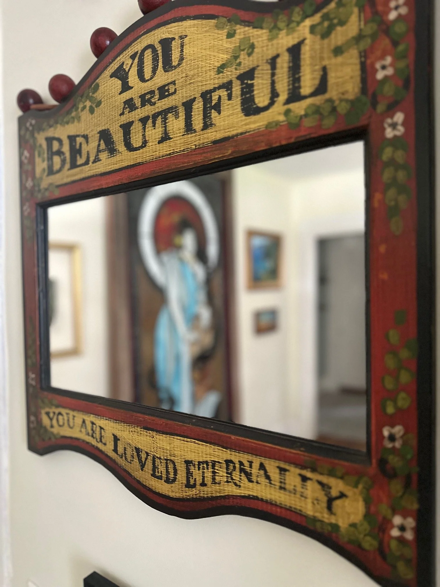 Decorative mirror with a vintage-style border and an inspirational quote that reads, "You are beautiful in every way, inside and out."