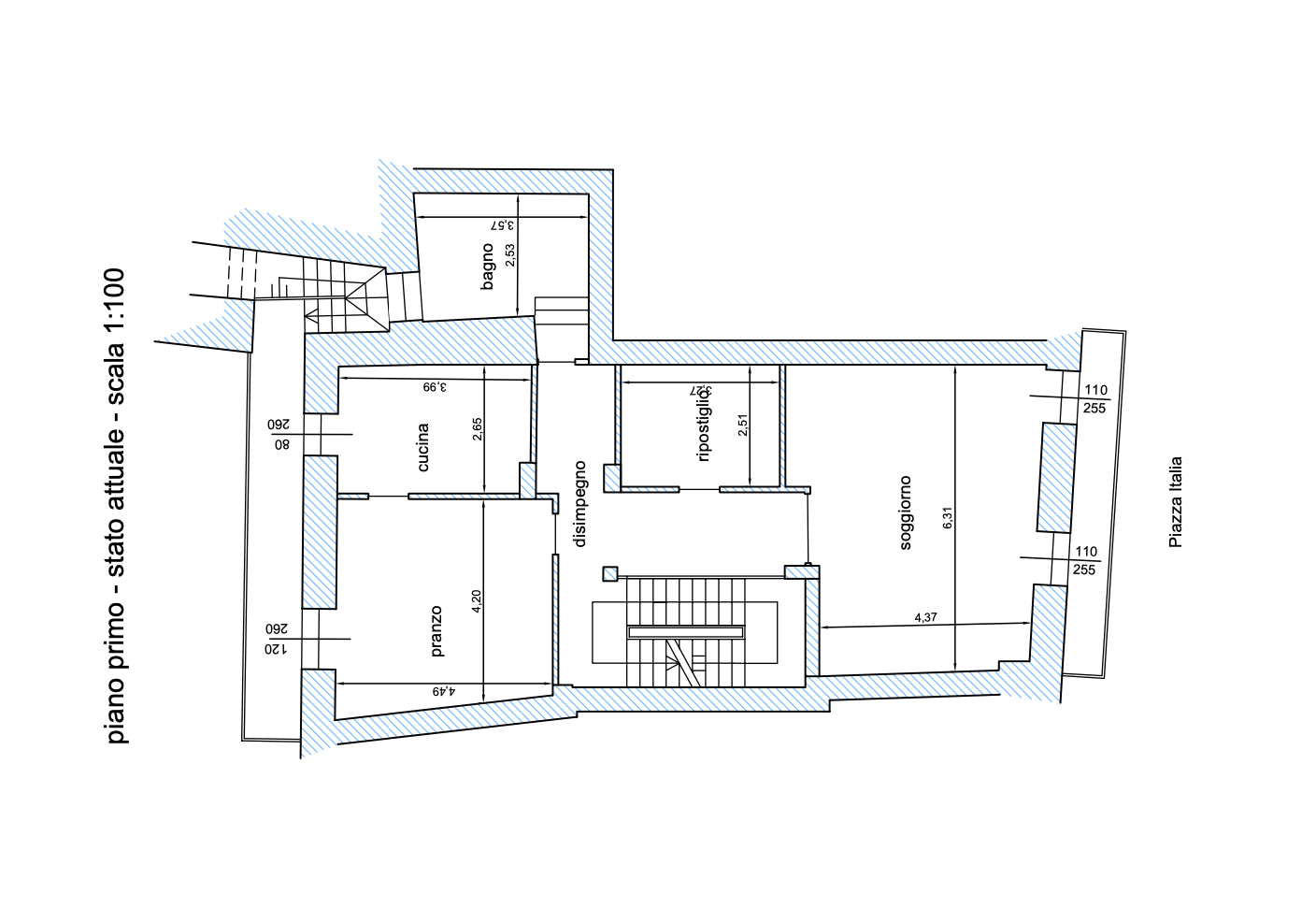 Architectural floor plan of an apartment with labeled rooms including a kitchen, bathroom, living room, dining area, bedroom, and storage. The plan includes dimensions and labels in Italian, such as "piano primo," "stato attuale," and "PIAZZA ITALIA." The layout shows walls, doors, and stairs.
