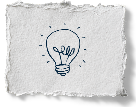 Drawing of a light bulb on torn paper background.