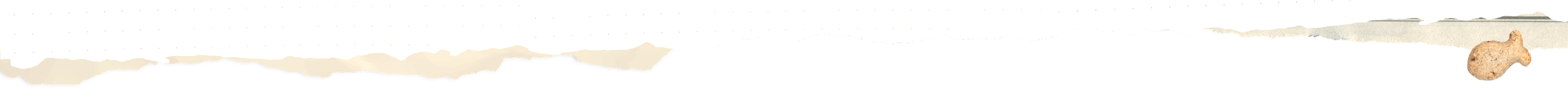A torn piece of paper revealing a landscape of mountains and sky with a small dog figurine in the corner.