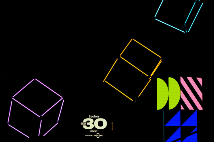 Colorful wireframe cubes and geometric shapes on a black background, with a 'Forbes 30 Under 30 Summit' logo in the lower left corner.