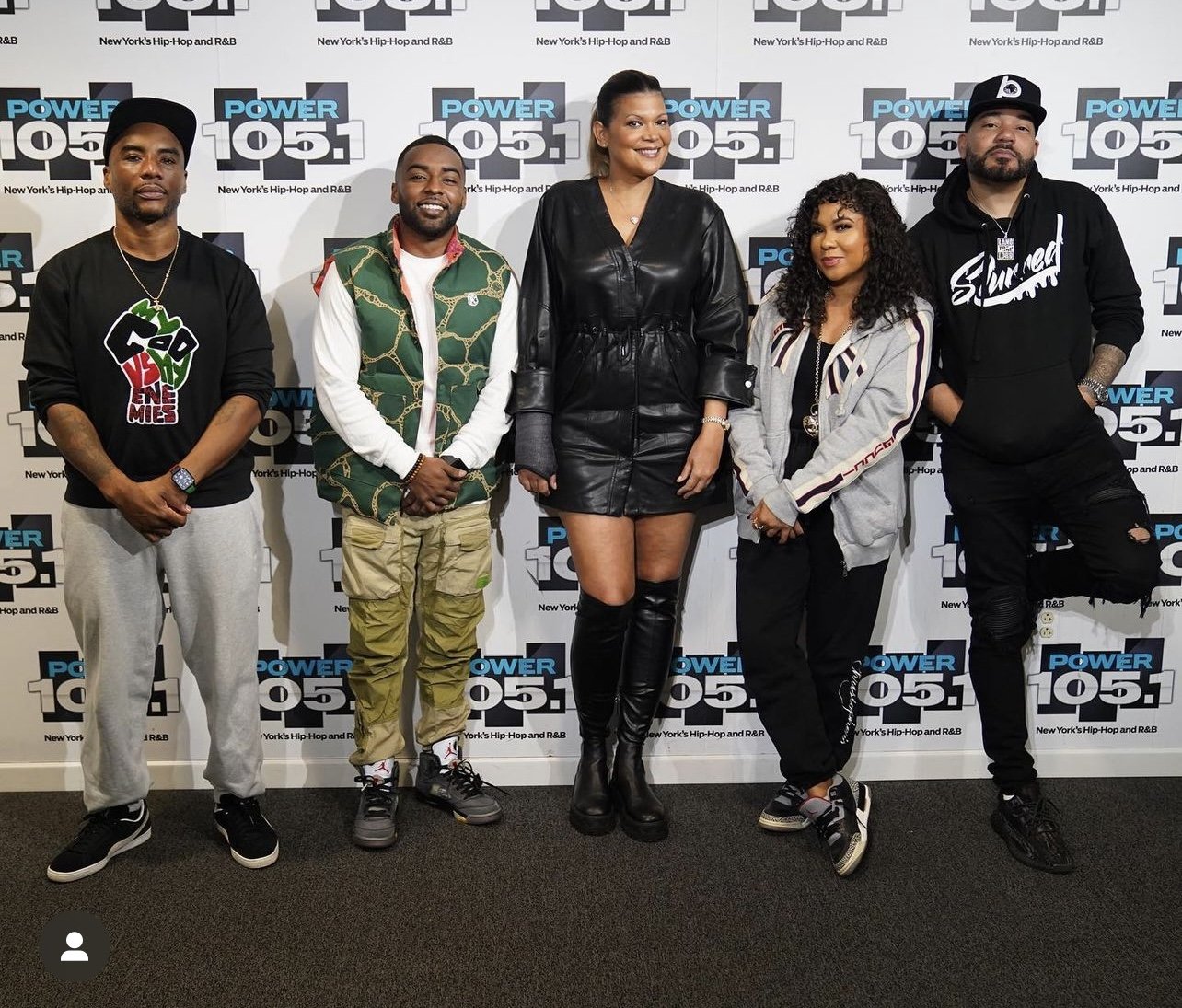 The Breakfast Club, with Ian Lara and Aida Rodriguez, stands in front of a Power 105.1 backdrop, posing for a photo. The group includes Charlamagne da god, DJ Envy, and Angela Yee.