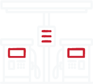 Two gasoline pumps at a fueling station under a canopy.