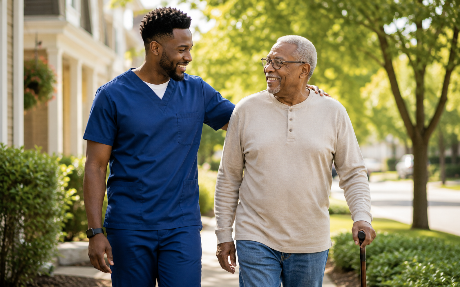 “A caregiver walking and talking with an older adult using a cane outdoors.”