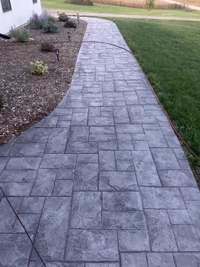 Two-tone stamped concrete sidewalk