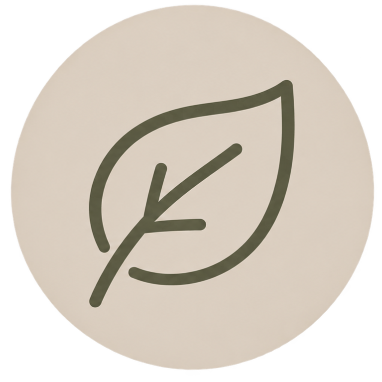 A minimalist illustration of a leaf with a line crossing through it.