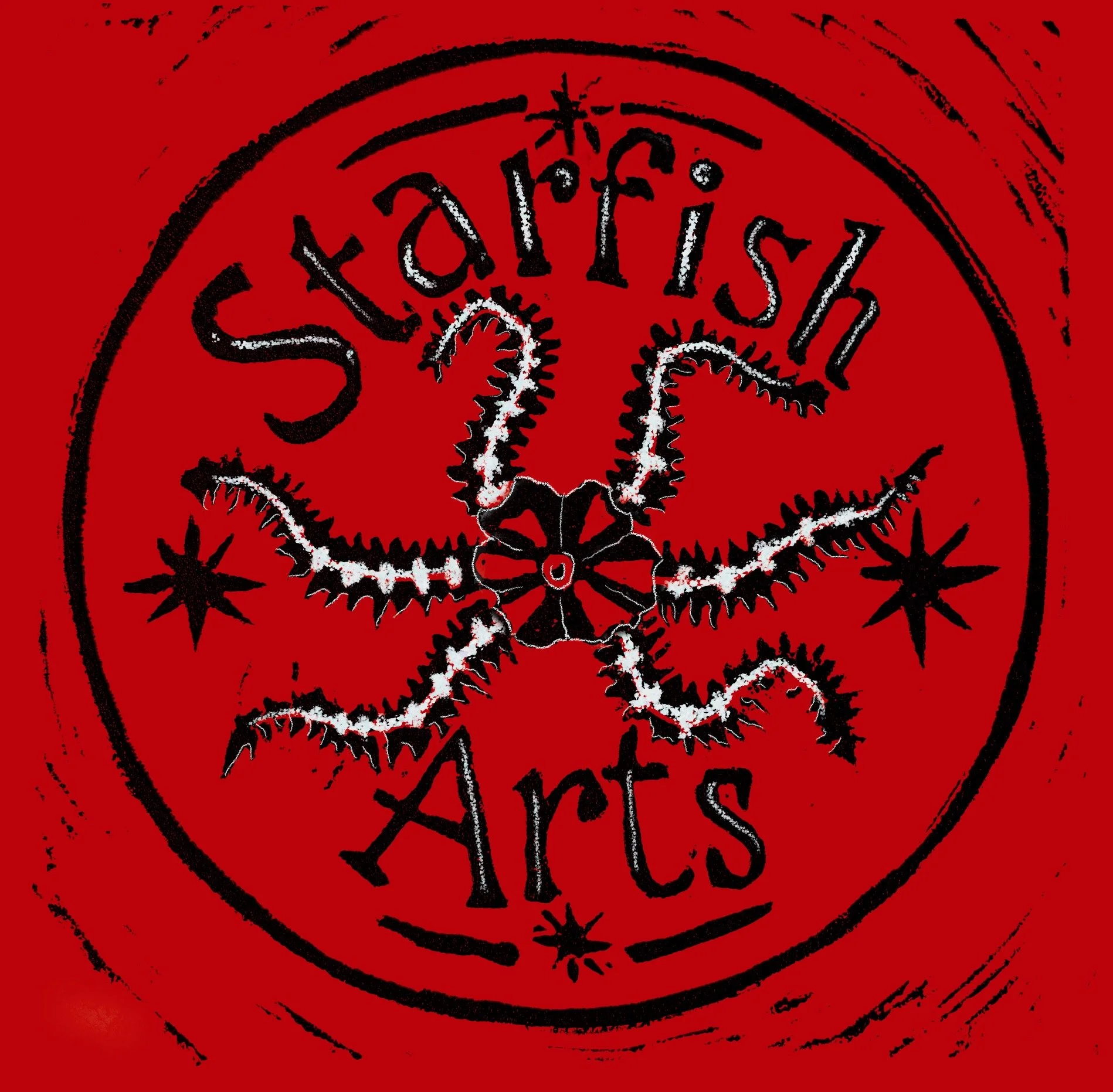 Close-up of the red circular stamp with the word 'Seattish' and tribal designs.