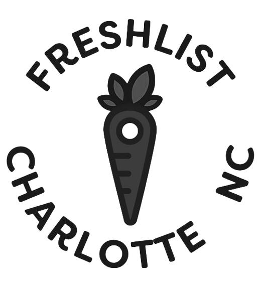 A black and white logo with a stylized carrot in the center, surrounded by the words 'Freshlist Charlotte NC' in a circular arrangement.