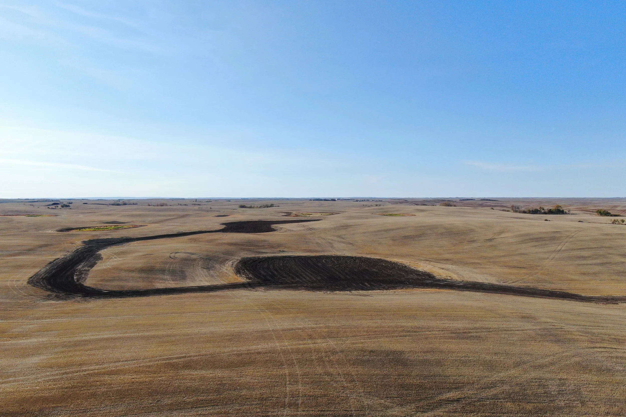 A large agricultural field with proper land drainage developed by Trimble GPS earth moving.