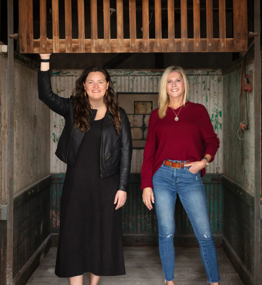 Deanna Jones Barlogie and Samantha Tanner, owners of Eastside Scrapyard, standing in the old service elevator that is a feature of the event space.