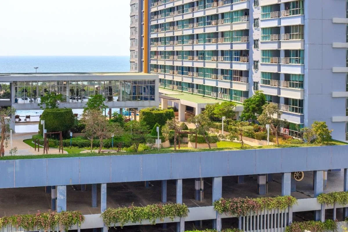 residential-complex-with-fitness-room-green-area-parking-lot-seashore-summer-day (1).jpg