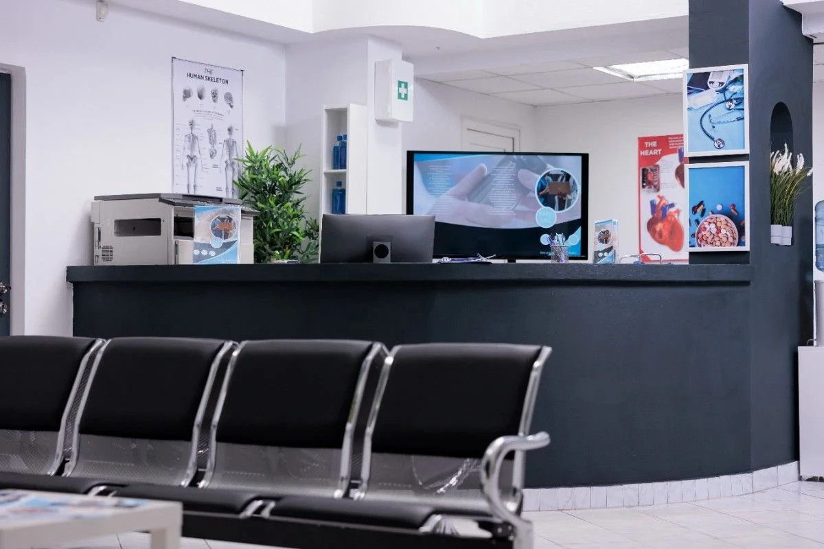 clinic-registration-counter-waiting-room-lobby-computer-make-checkup-appointments-with-healthcare-report-papers-empty-hospital-reception-desk-with-medical-forms-insurance-support (1).jpg
