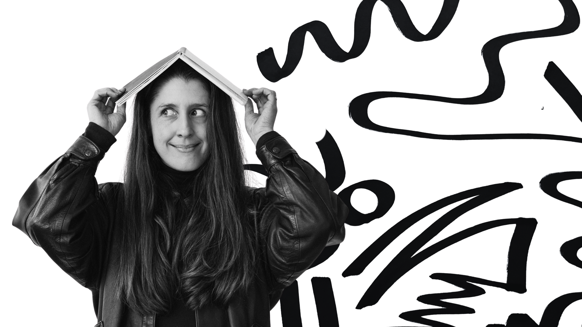 Kate wearing a leather jacket holds a book over her head, with abstract black graffiti-style graphics in the background.