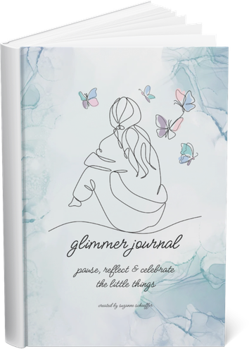 Cover of a journal titled 'glimmer journal' with an illustration of a girl sitting and surrounded by butterflies on a light watercolor background.