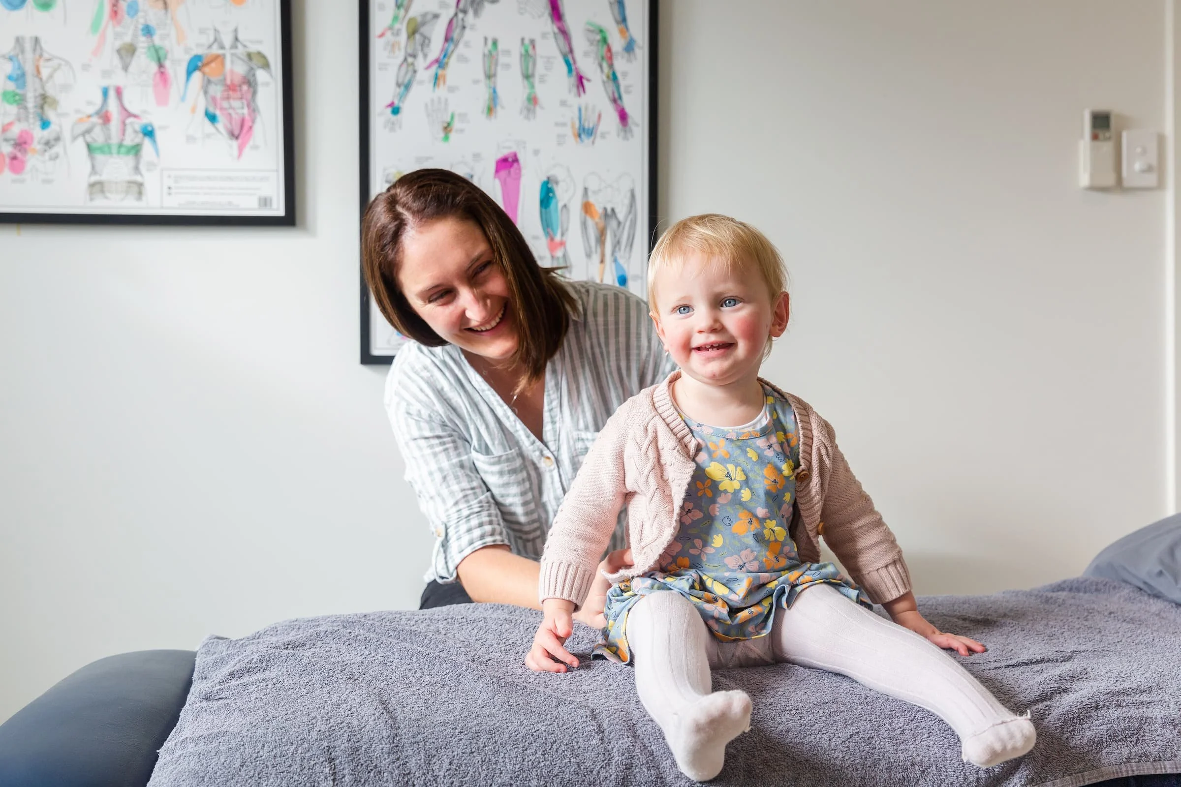 Dr Rosalind Hill providing paediatric osteopathic care for a young child at Live Better Be Stronger Osteopathy & Performance in Adelaide.