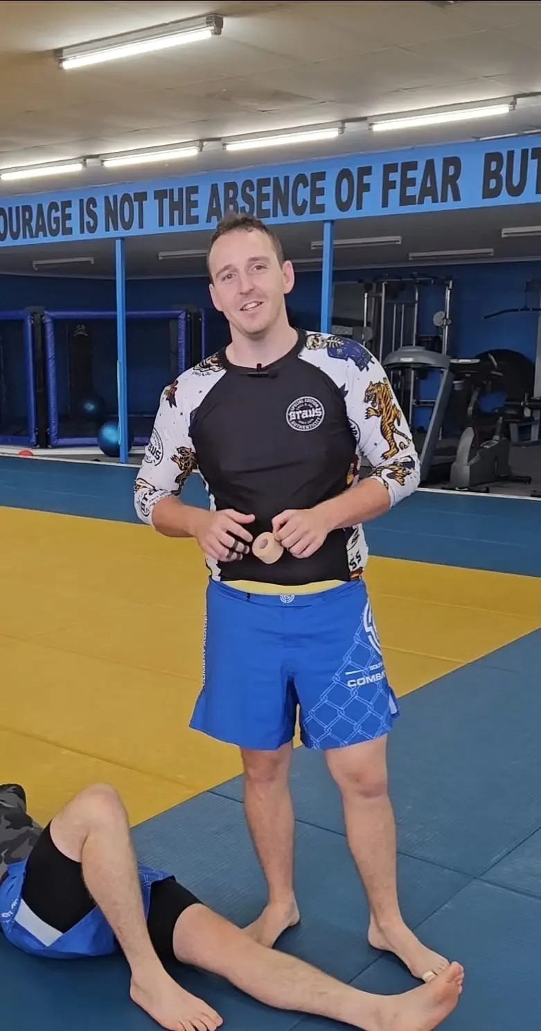 Dr Joshua Saxton in a Brazilian jiu-jitsu training environment in Adelaide.