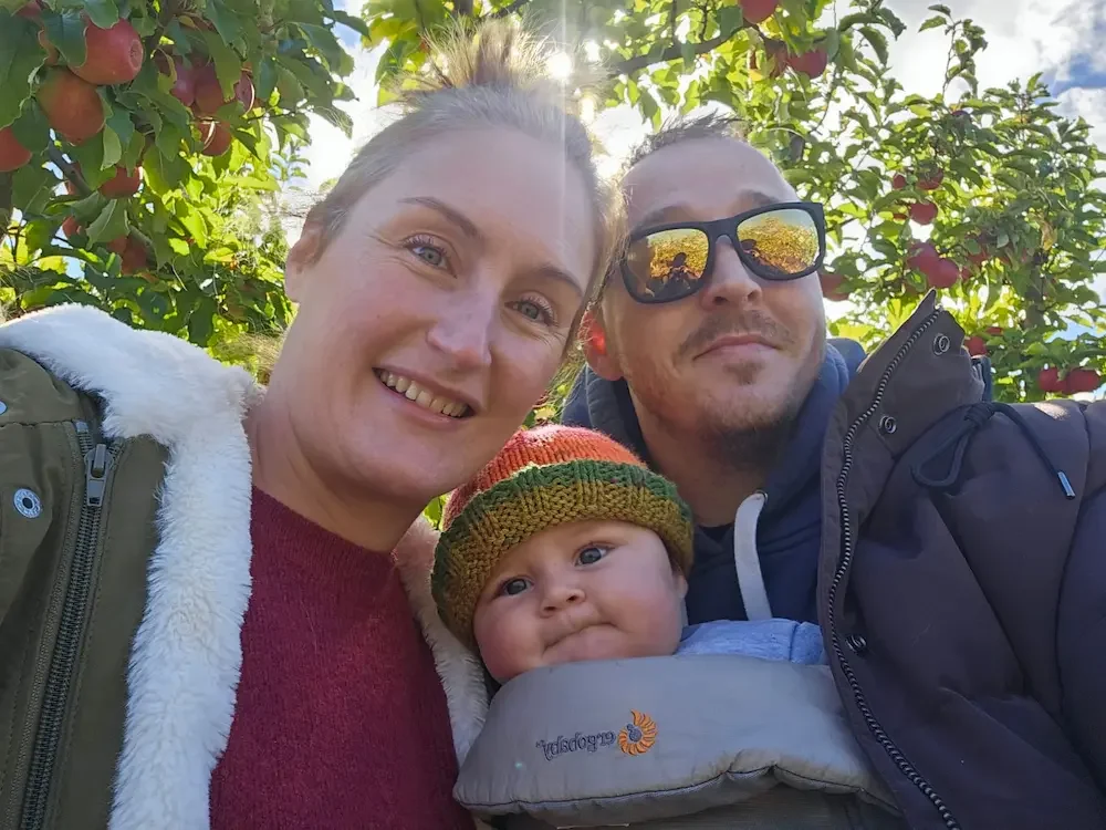 Dr Rosalind Hill with her husband Josh and daughter Evie during a family outing.