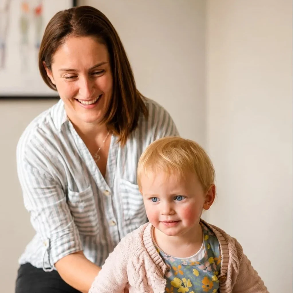 Child receiving gentle paediatric osteopathy treatment with a caring osteopath in a calm clinical environment in Adelaide.