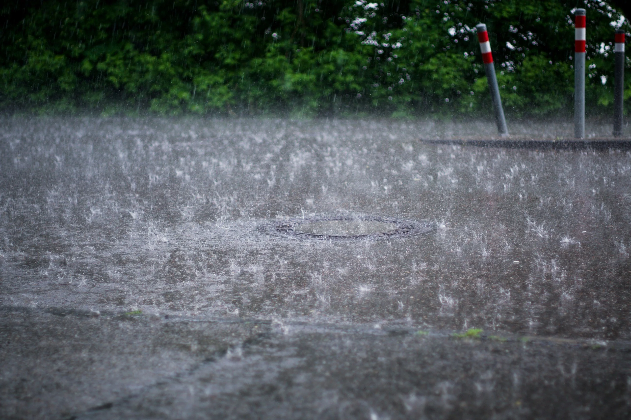 Hard rain hitting pavement
