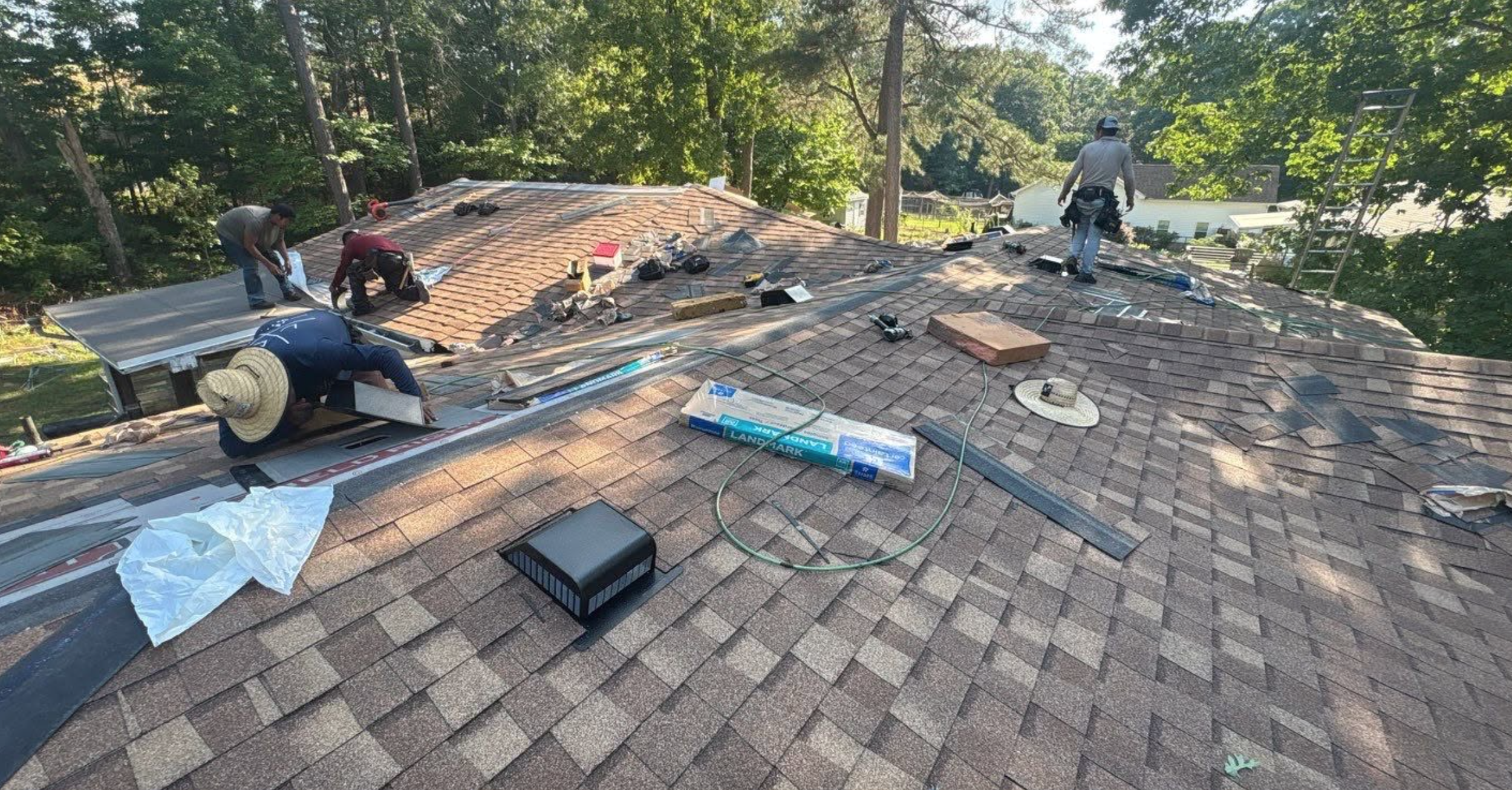 Roof Replacement in Progress with New Asphalt Shingles