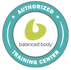 Authorized training center badge for Balanced Body with a green and white logo and blue circular border.
