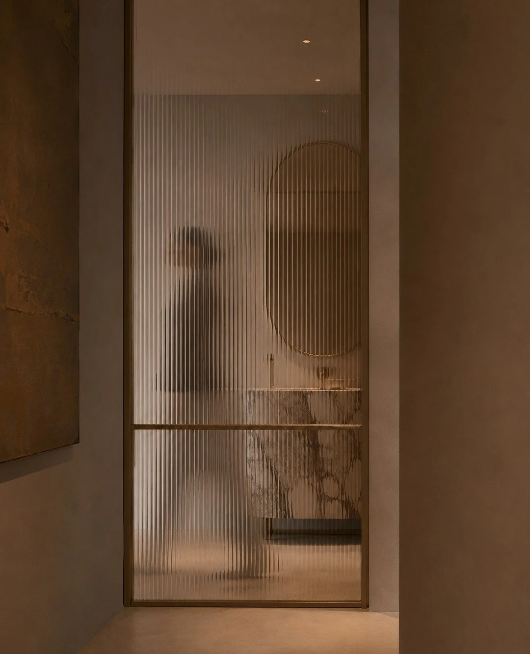 Every material has a role to play.⁠
⁠
Fluted glass introduces privacy without closing a space off, while filtered light brings warmth and softness throughout the day.⁠
⁠
Simple details, thoughtfully considered.