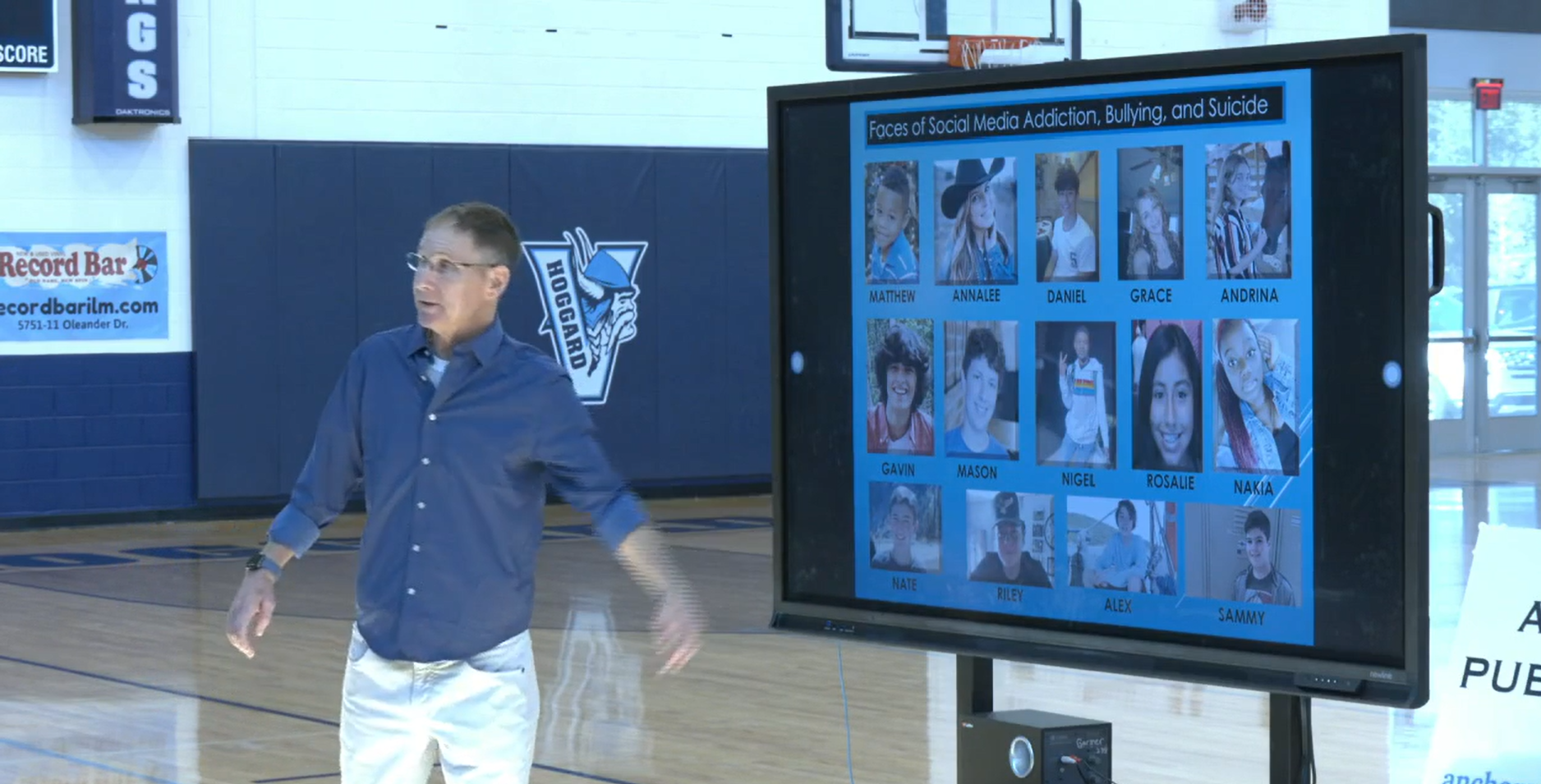Michael J. Bowen engage in a presentation talk for High School students.