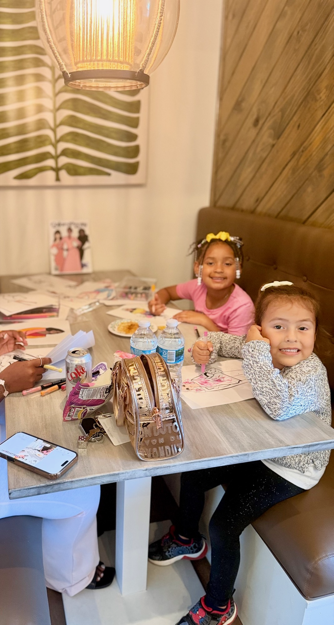 Wide view of a Color In Pretty community coloring event setup