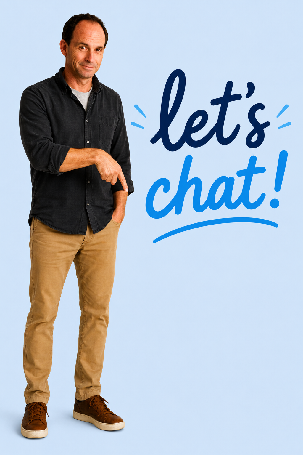 A man wearing a black shirt and beige pants pointing at the text 'let's chat!' on a light blue background.
