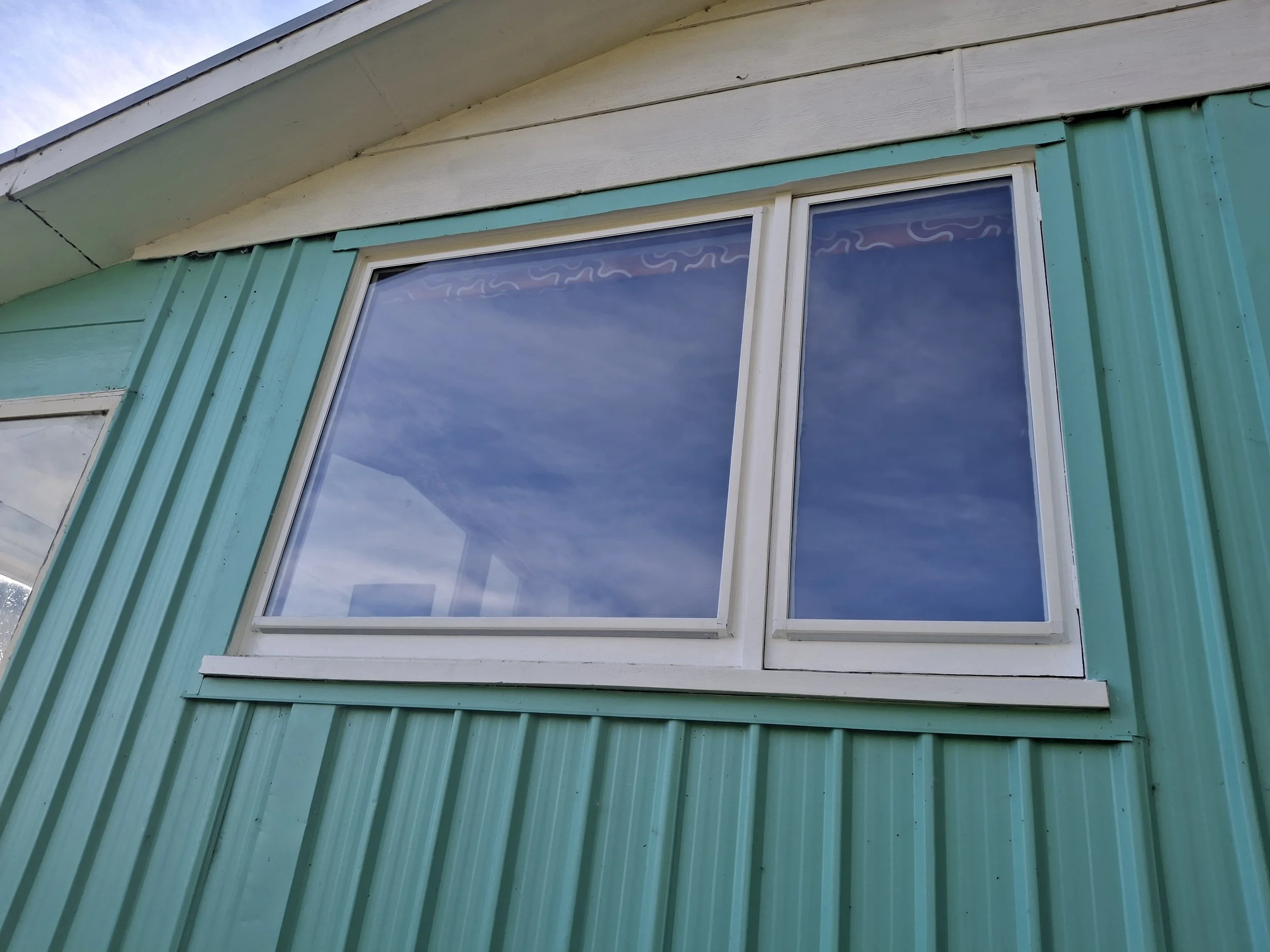 Close-up view window, After picture double glaze retro fit, EVS Triple glazing, clip on.