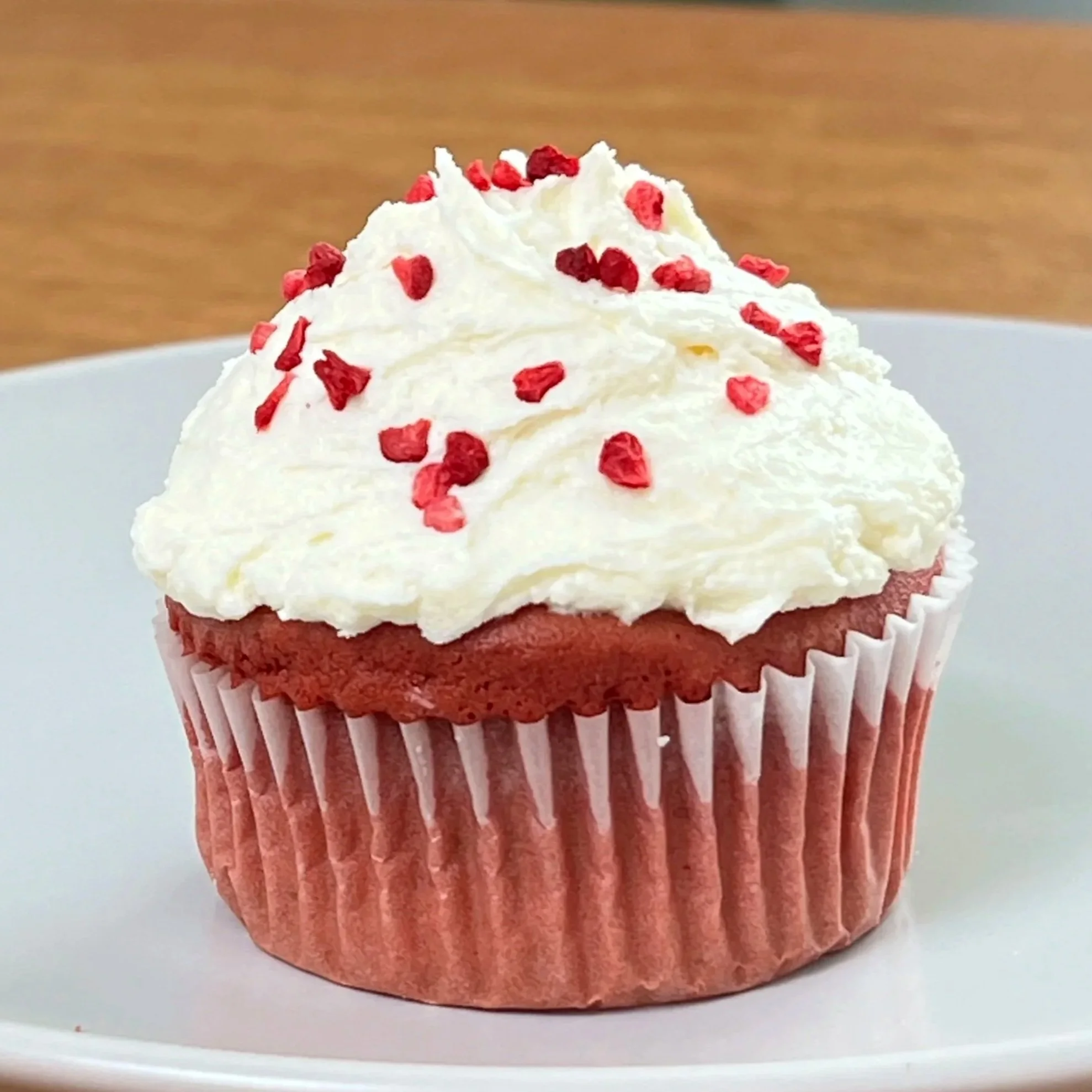 Gluten-Free Red Velvet Cupcakes with Vanilla Buttercream and Dried Raspberry bits