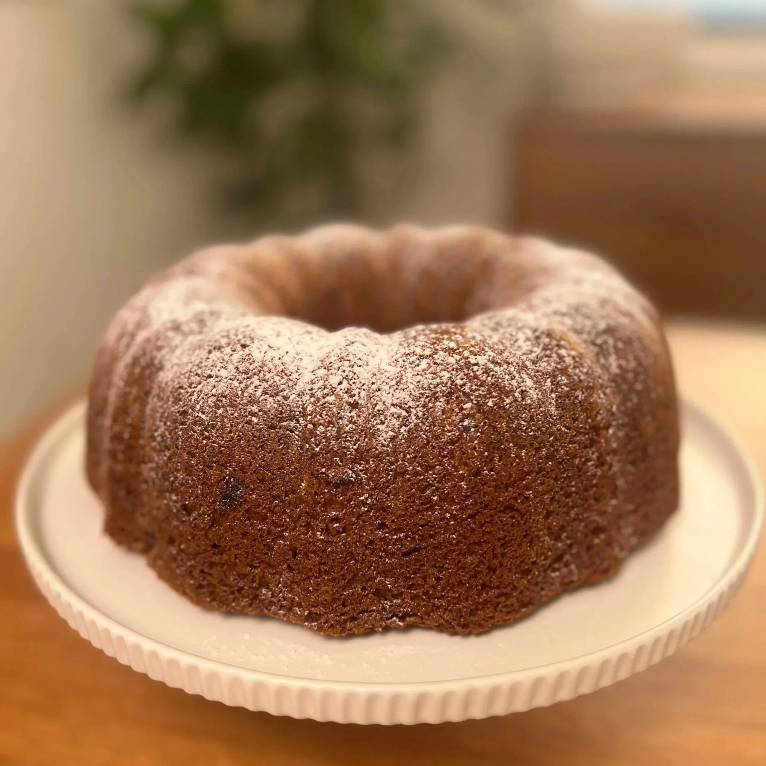 Gluten-Free Cranberry Almond Bundt Cake with a light dusting of Icing Sugar