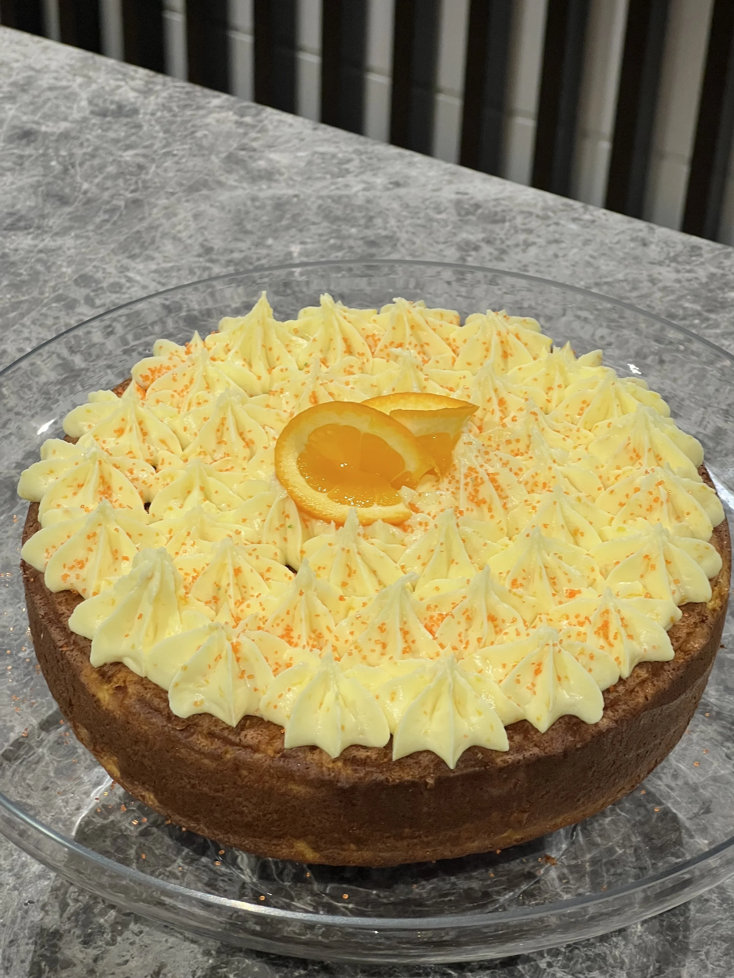Rich Smooth Orange Buttercream topping Flourless Orange Cake
