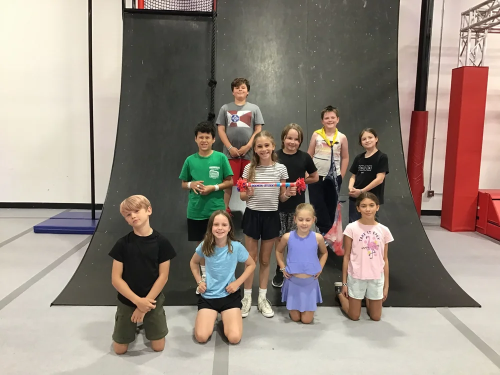 Group of youth ninja athletes together at Octo Ninja in Austin