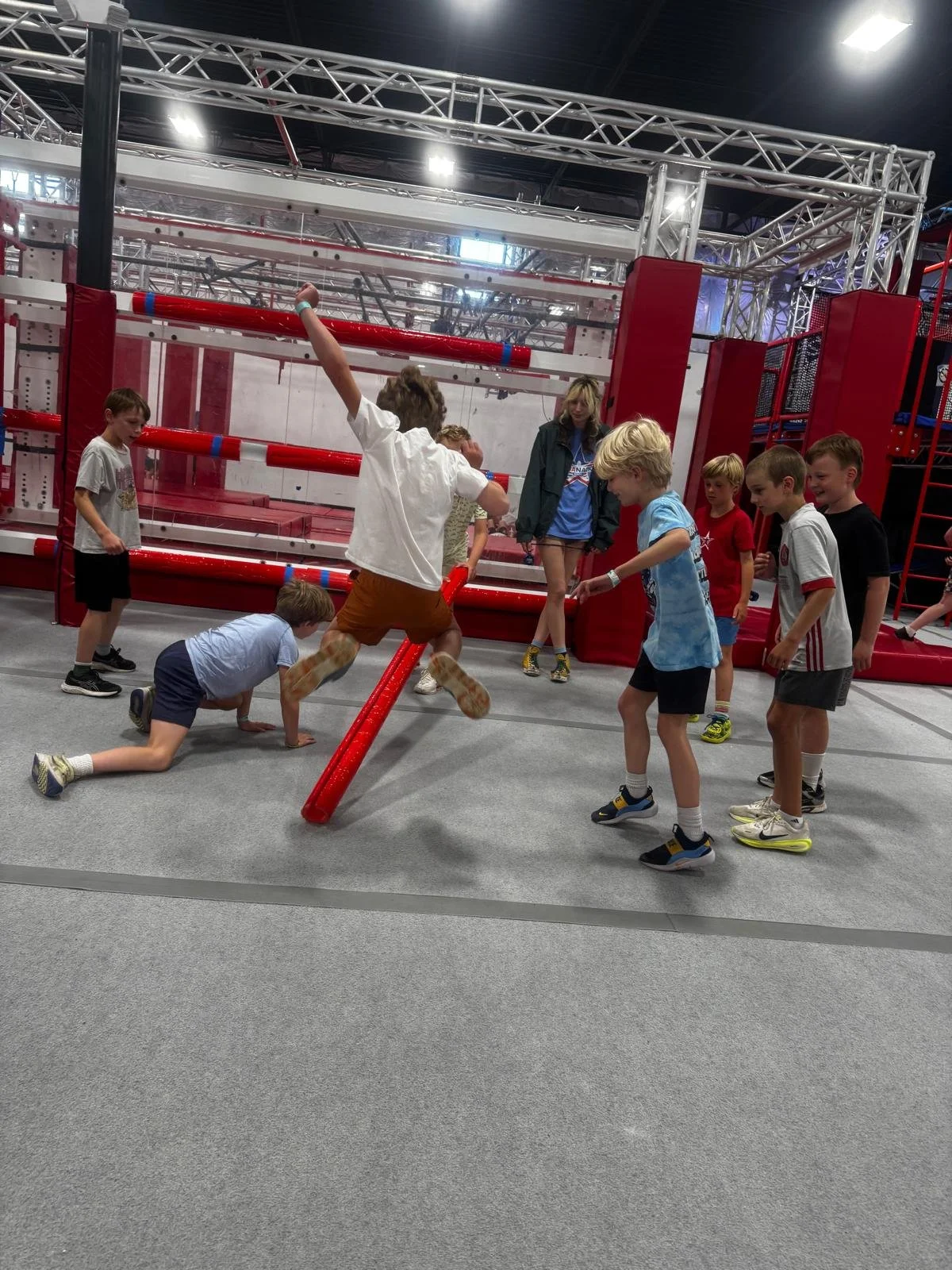 Kids playing a group challenge during Octo Ninja Camp