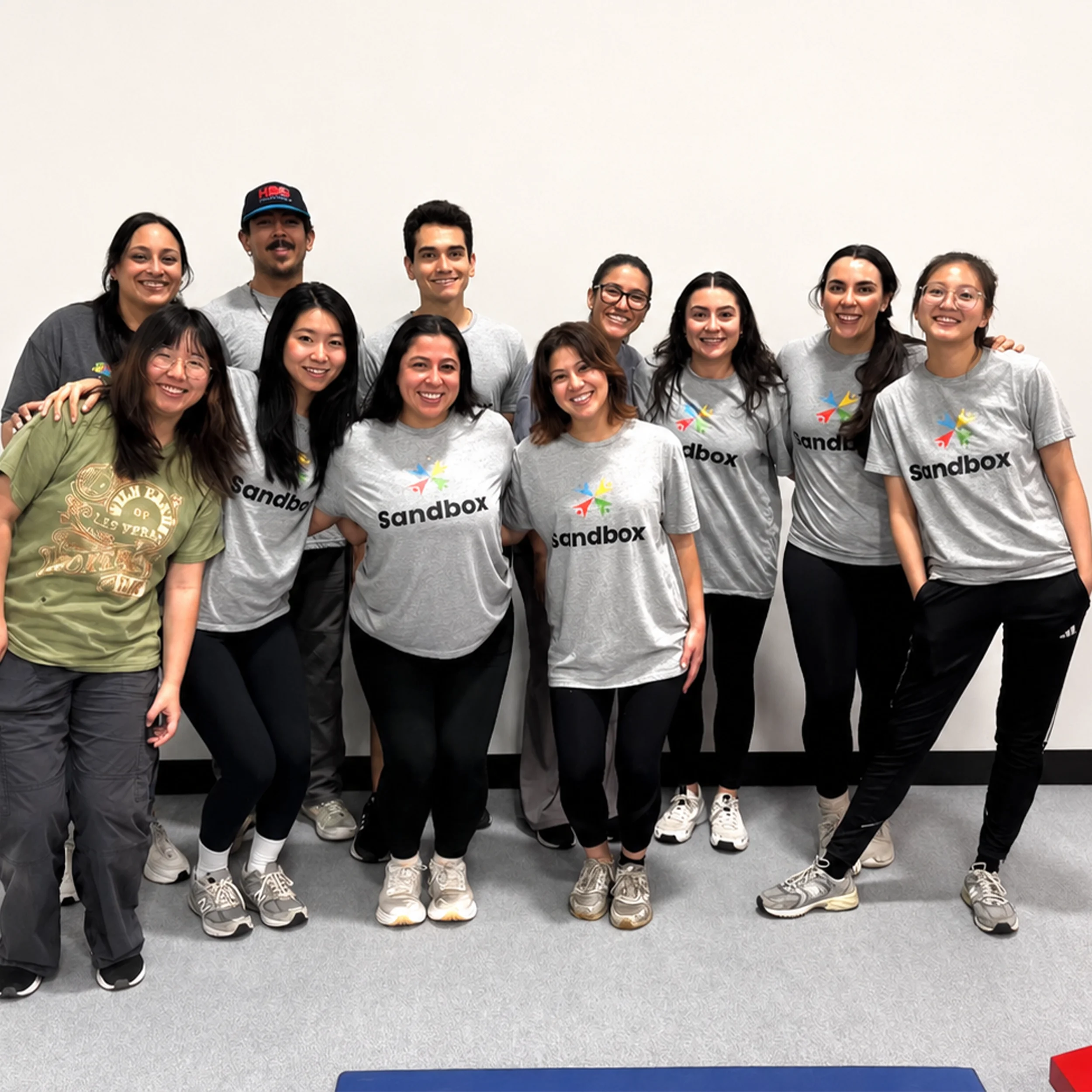 Corporate group visiting Octo Ninja for a team-building experience in Austin