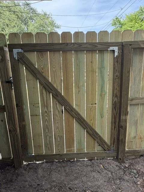 Wooden backyard gate with horizontal and diagonal support beams, Residential Privacy