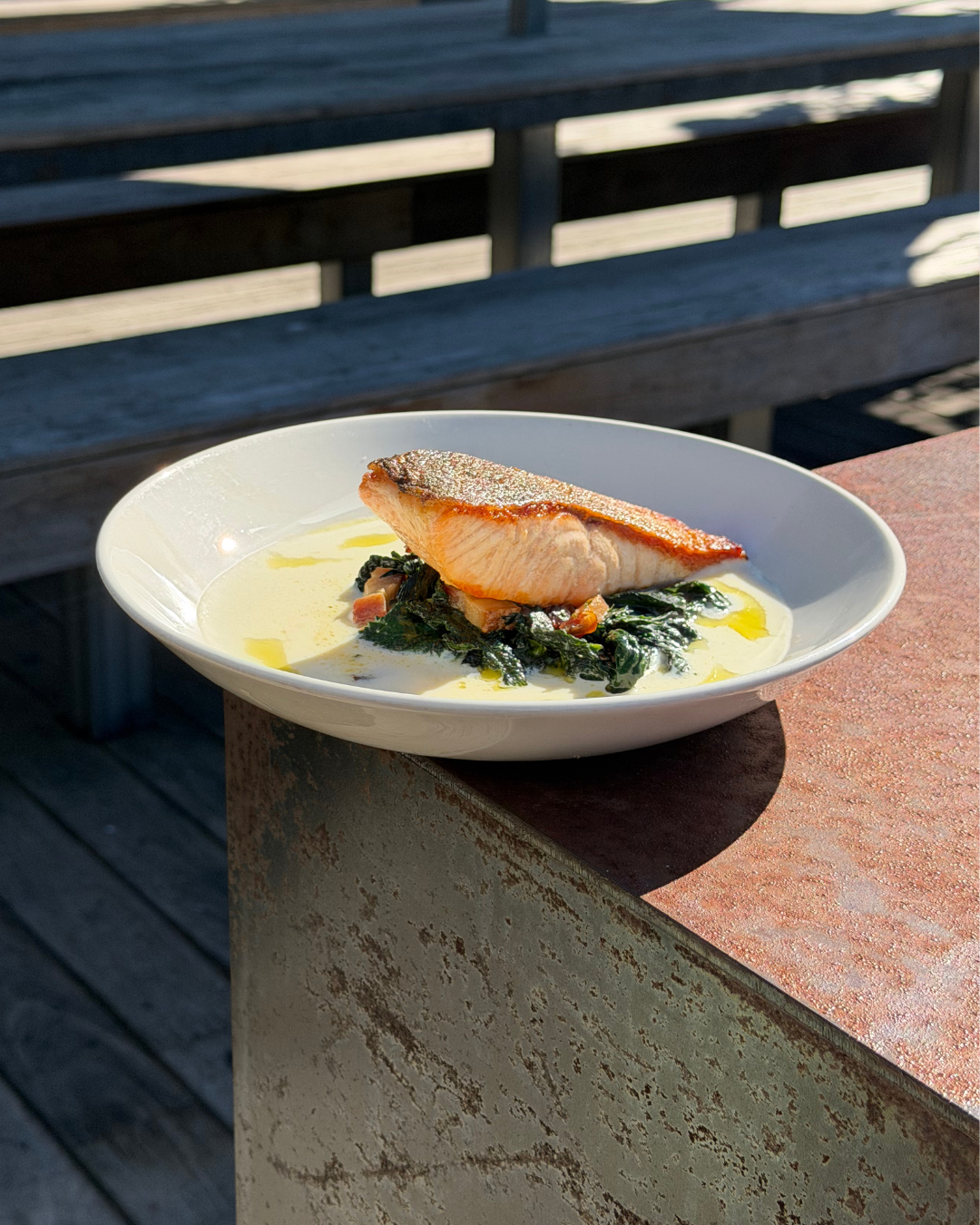 Roast Atlantic salmon fillet w. black cabbage, parsnip cream & smoked bacon