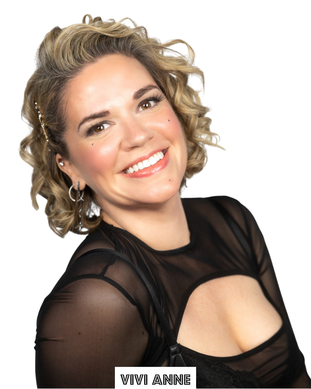 Portrait of a woman with curly blonde hair, smiling and wearing a black sheer top, against a white background, with the text "VIVI ANNE" at the bottom.