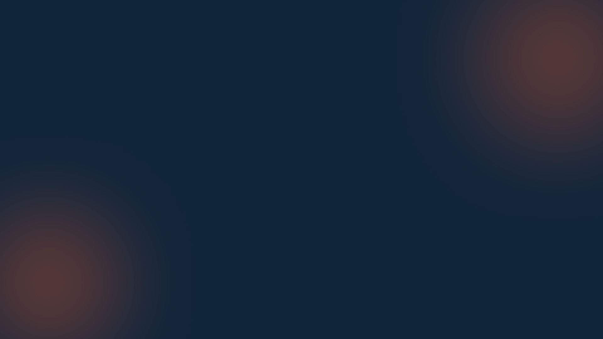 Blurred background with dark blue and red hues, no discernible objects or details.