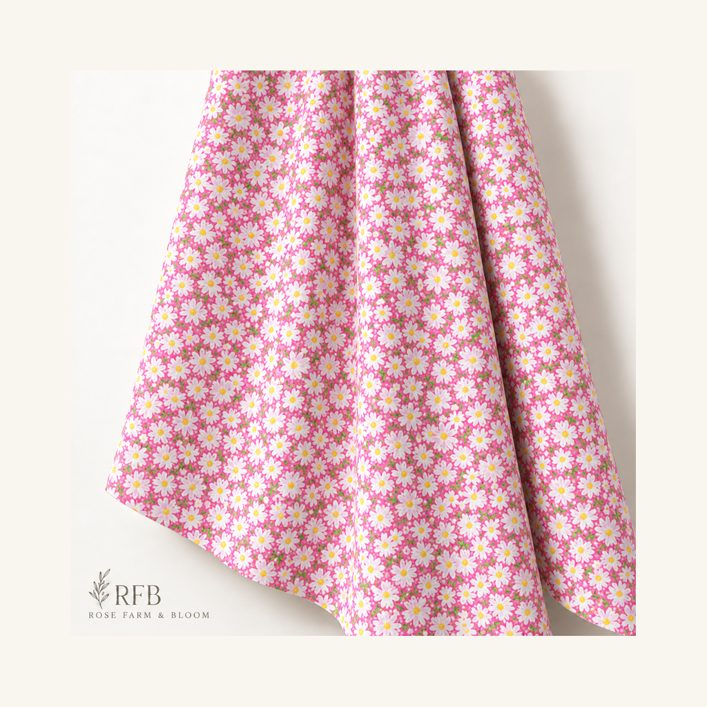 Fabric Traditions Pink Packed Daisies Cotton Fabric - folded fabric
