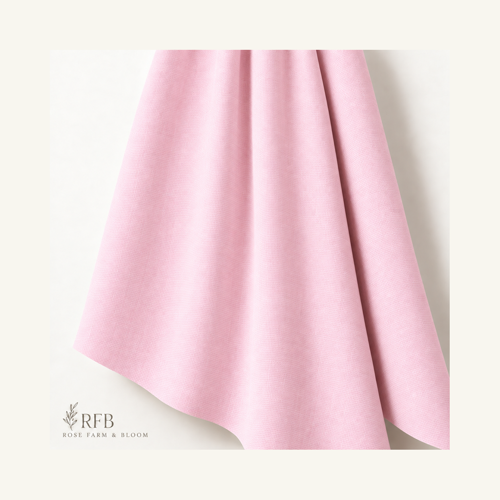 Springs Creative Light Pink Solid Cotton Fabric - folded fabric