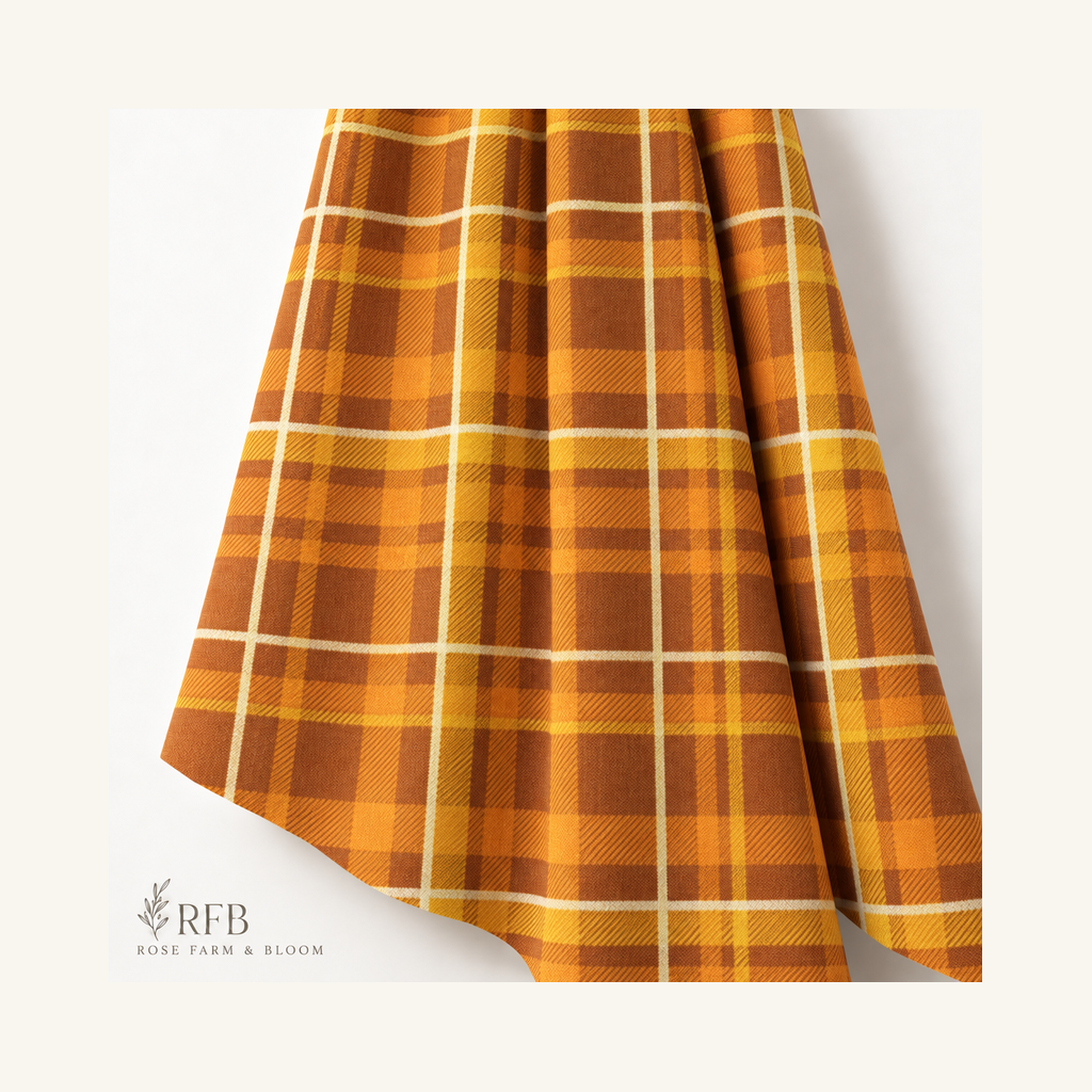 Fabric Traditions Rust Plaid Glitter Cotton Fabric - folded fabric