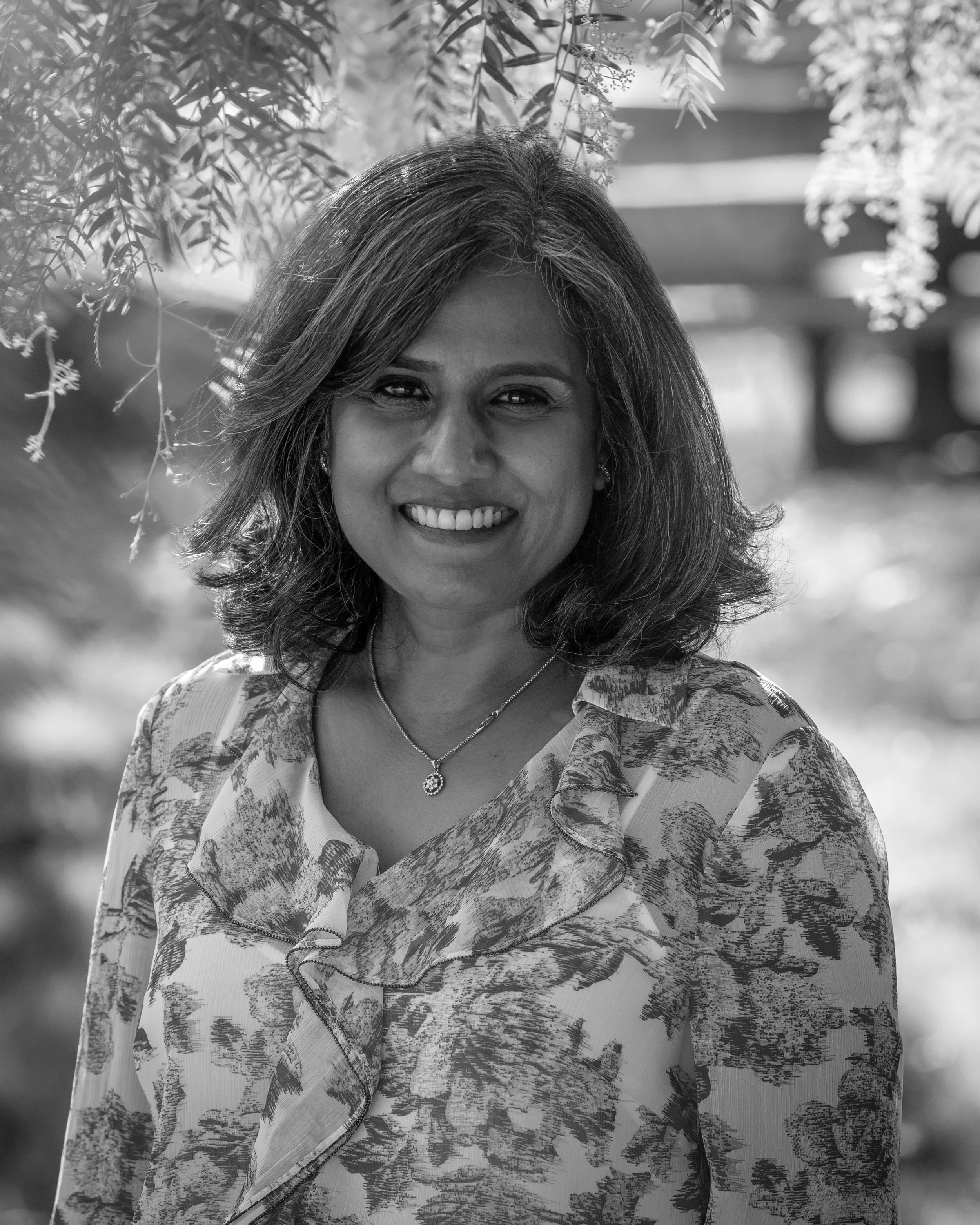 Latha Rao, fractional COO headshot in black and white