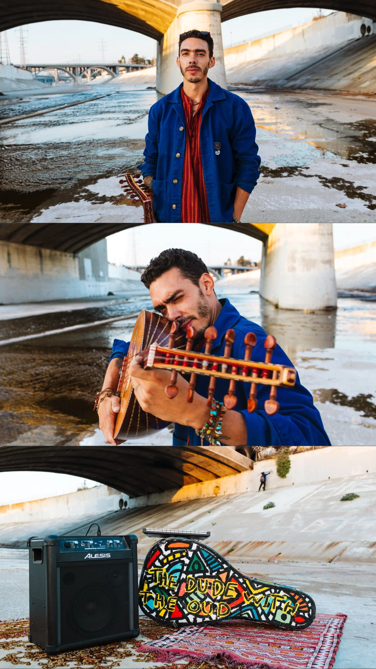 A young man playing guitar under a bridge during sunset, with audio equipment and a colorful skateboard nearby.
