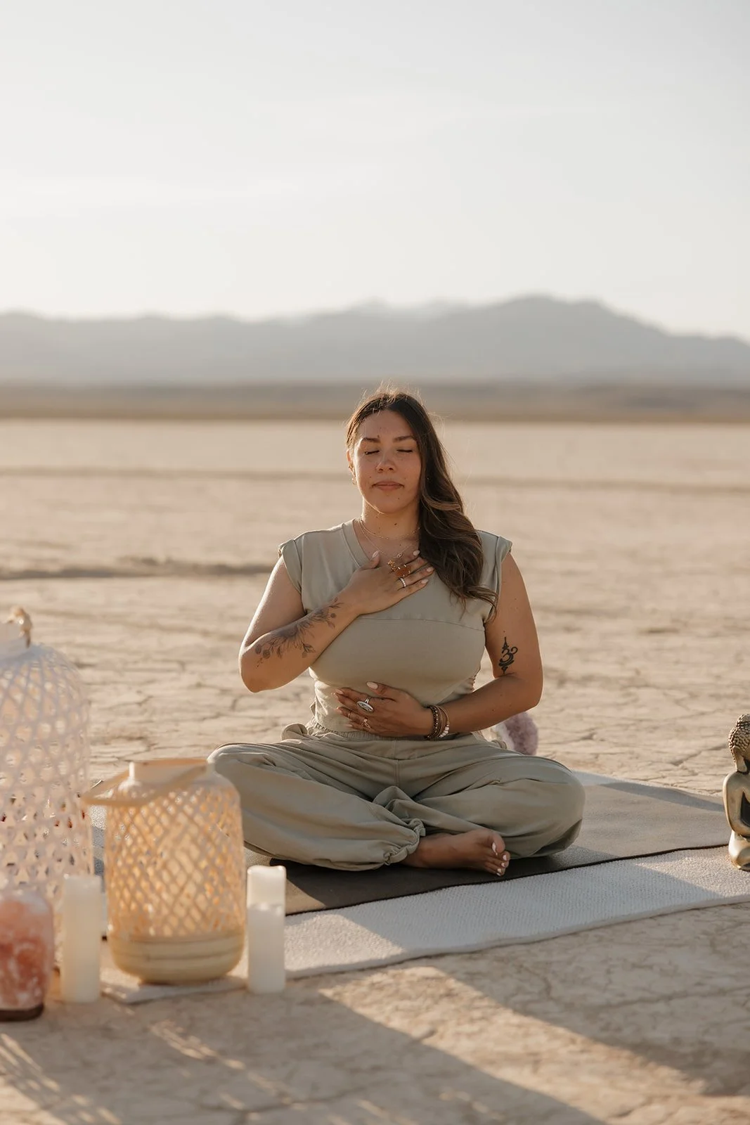 Trauma therapist practicing mindful breathing in the Nevada desert, representing grounding, self-regulation, and nervous system resources used during Phase 2 of EMDR therapy.